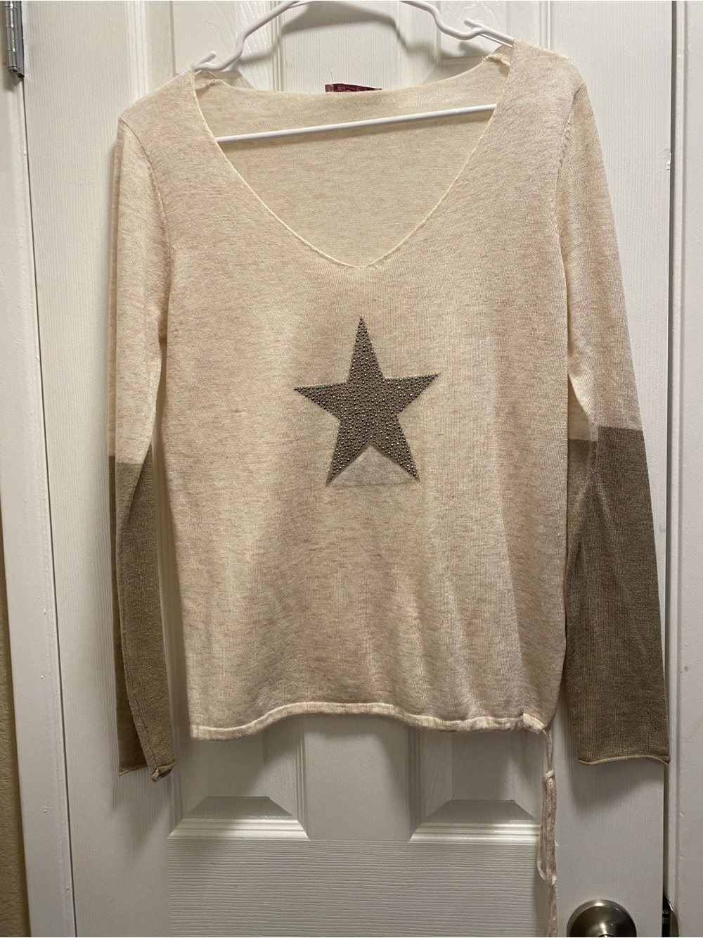 Boutique Beige V-Neck Star Accent Sweater with Olive Sleeves